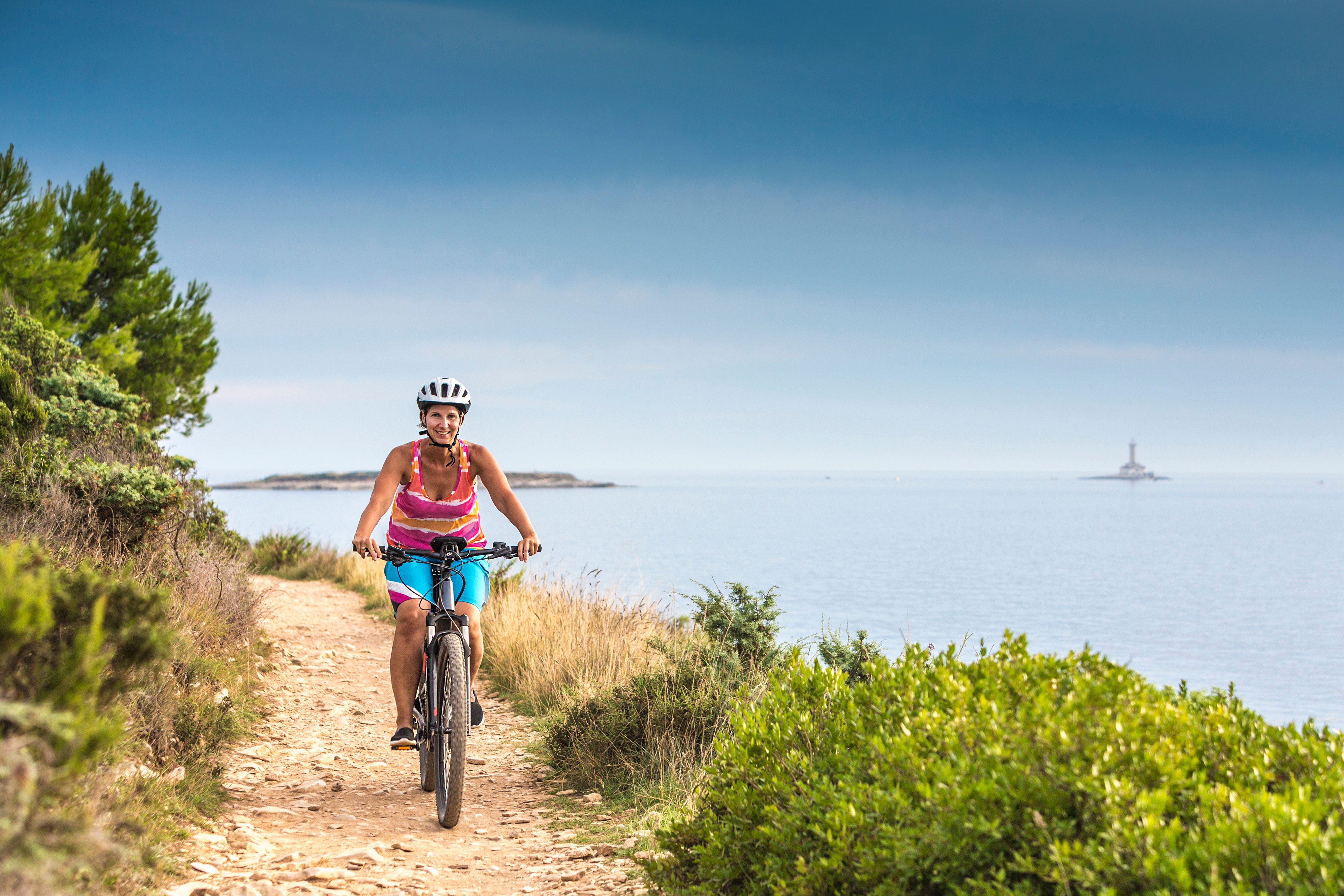 Cycling by the beach